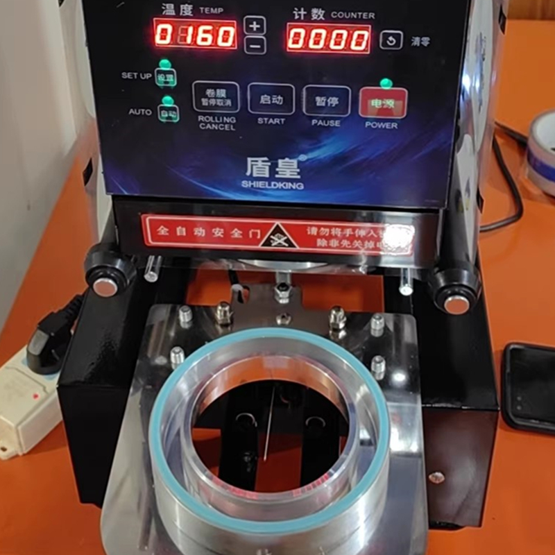 Coffee Tea & Company - LY Plastic Papieren Bekers Sluitmachine voor